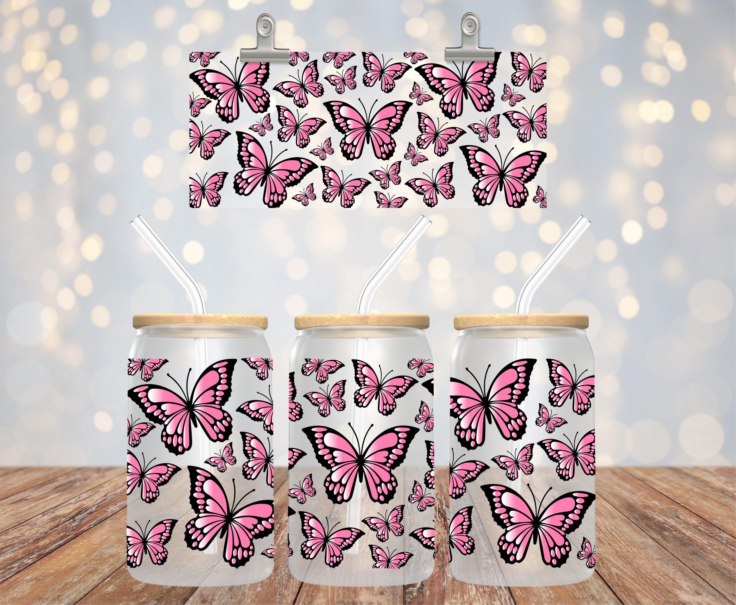 UV DTF cup wrap med rosa fjärilar på 16 oz glass can